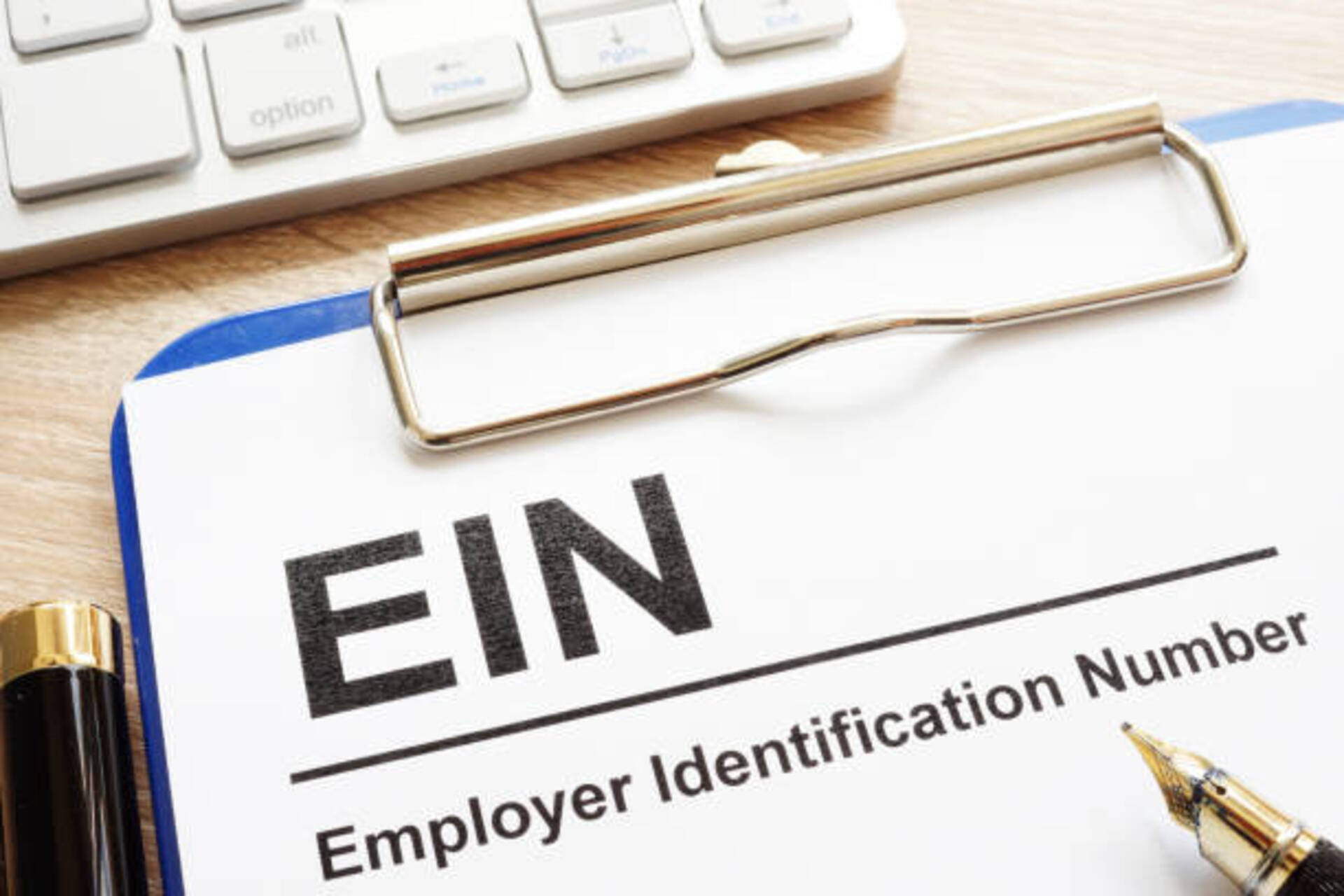 Employer Identification Number (EIN) on a clipboard.